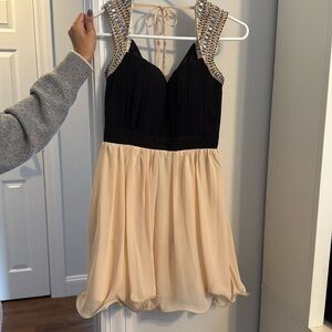 Beige and black dress